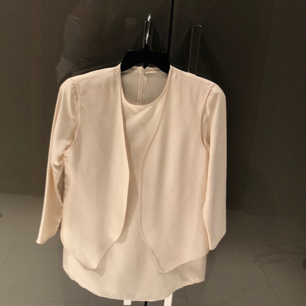 Beige blouse with attached vest